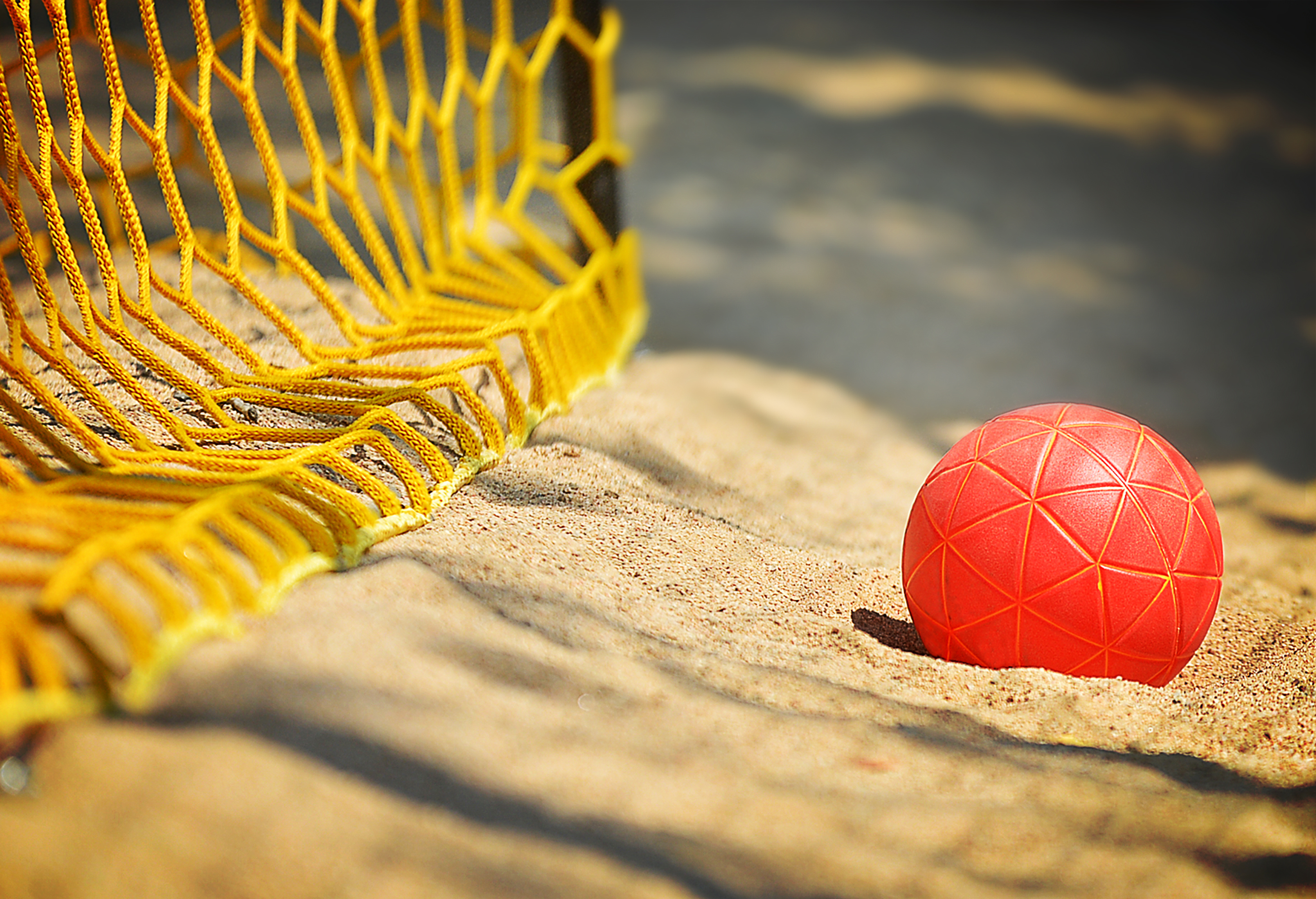 Beach handball ball and part of the goal